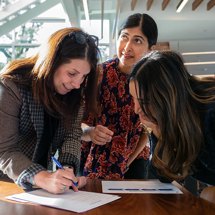Staff working together at the Michael and Susan Dell Foundation.